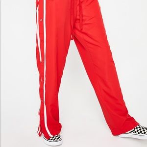 Dolls kill- wild honey tracksuit pants